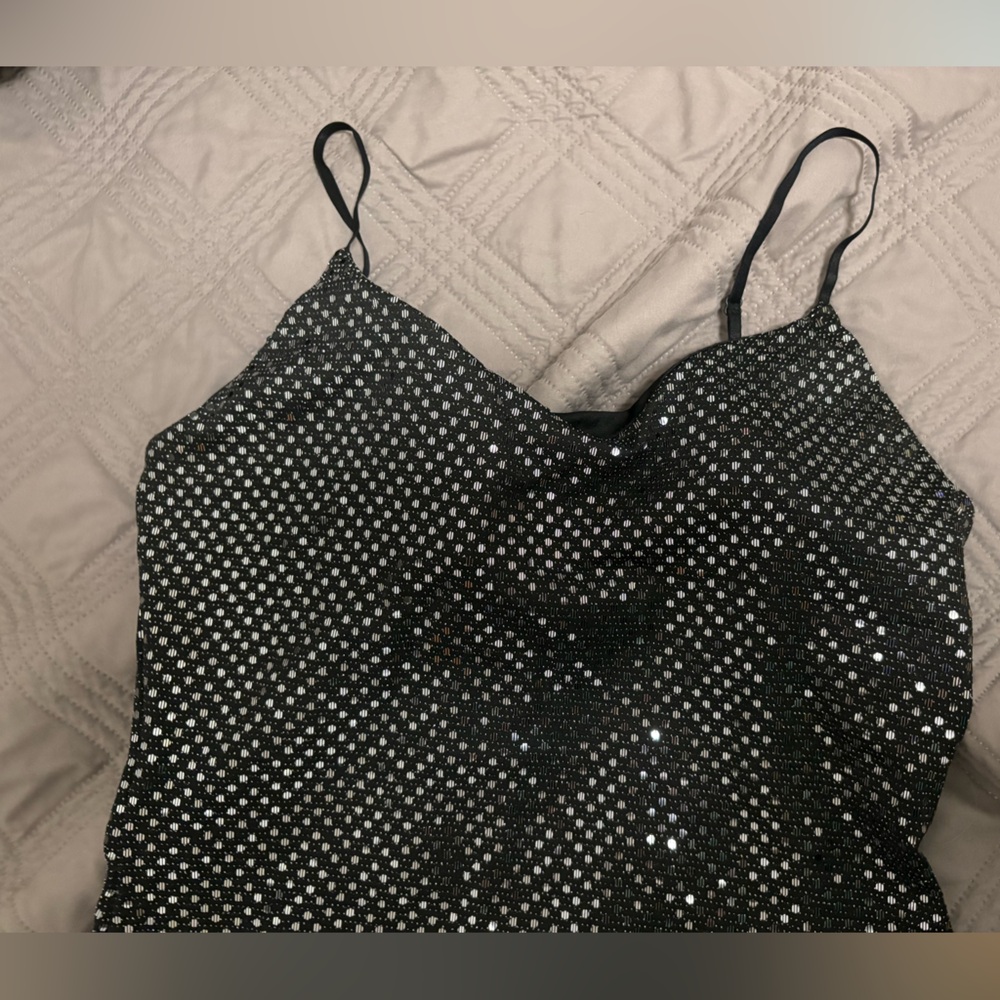 2 long gowns: Black and Silver chains; Black and Silver Sequin. Price for both.